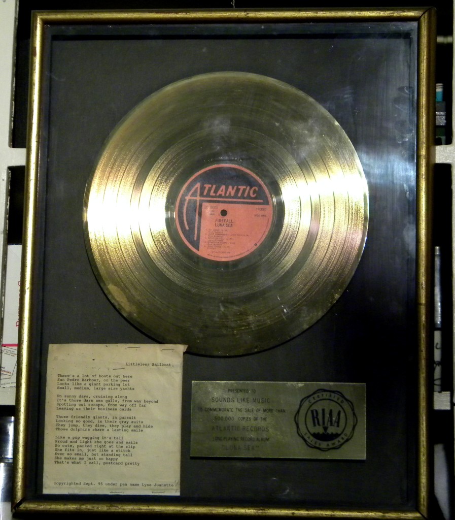 Post Card Pretty in a Framed Gold Record awarded for Luna Sea