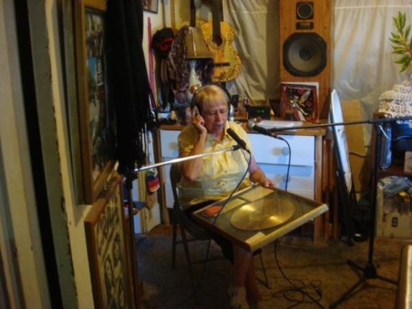 Mom performing her poem titled Postcard Pretty